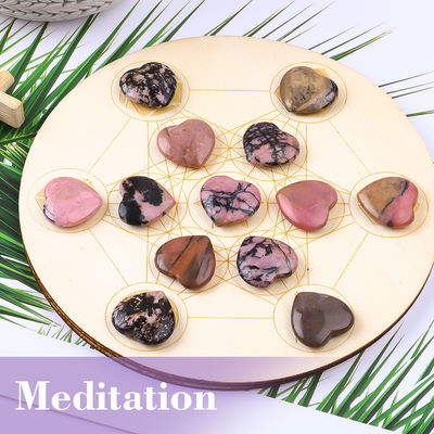 Các tinh thể hình trái tim Rhodonite kính để cân bằng Chakra