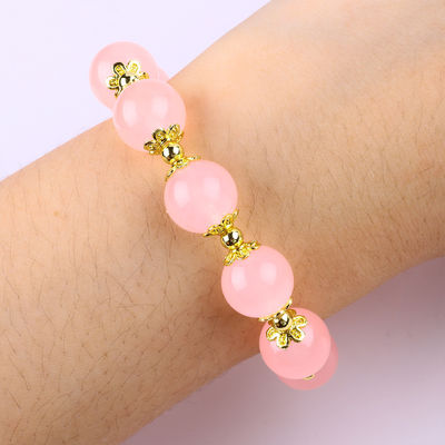 Chiếc vòng đeo tay màu hồng 12mm có nét ngọc quý màu hồng với sự quyến rũ của hươu