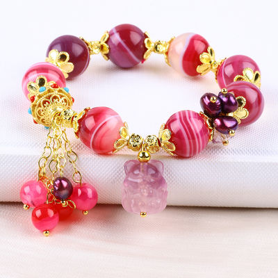Chiếc vòng tay đá Agate màu hồng 14mm với hình chạm khắc cáo chín đuôi màu tím