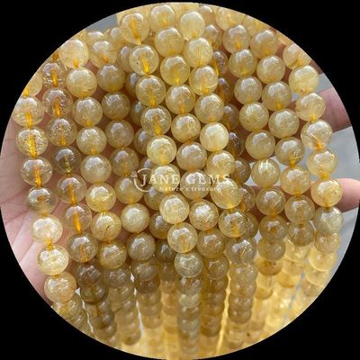 Đá đắt lỏi đúc tròn cắt lửa thạch anh vàng Rutilated thạch anh đai sợi cho làm đồ trang sức DIY