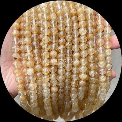 Đá đắt lỏi đúc tròn cắt lửa thạch anh vàng Rutilated thạch anh đai sợi cho làm đồ trang sức DIY